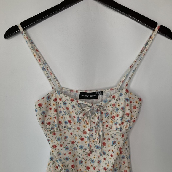 PrettyLittleThing Cream Ditsy Floral Tie Front Dress - Picture 9 of 9